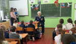 Школьники из Чебачего поздравили защитников Отечества небольшим концертом